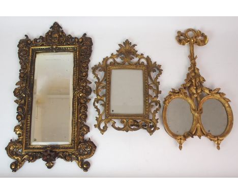 A GILT-GESSO MINIATURE PORTRAIT DUET FRAME inset with mirror plates, acanthus carved, with loop finial, 20cm wide x 30cm high