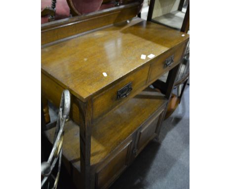 Victorian oak buffet, fitted with two drawers over an open shelf, two panel doors under, width 91cm.