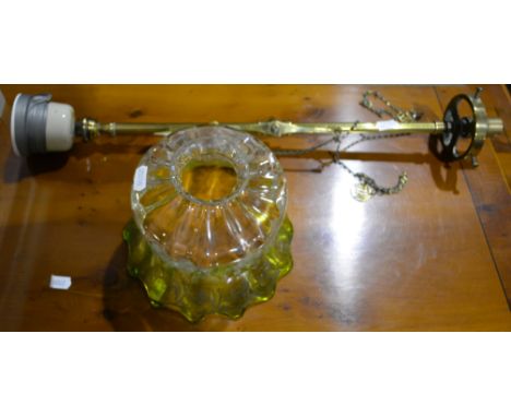 A ceiling light with a lime tinted shade.