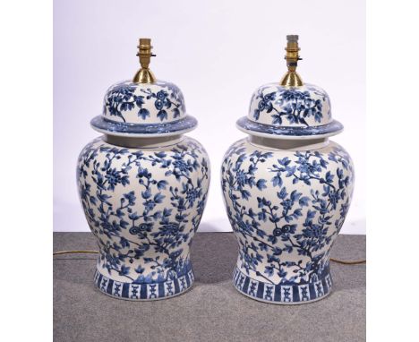 Pair of blue and white vase shaped lamp bases, 58cm.