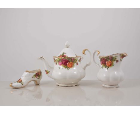 Royal Albert bone china tea set, Old Country Roses pattern, together with an Old Country Roses wall clock and shoe ornament.