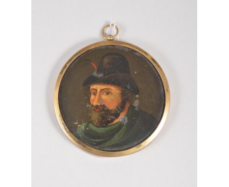 Continental School, head and shoulders portrait of a gentleman, on papier mache, gilt metal frame, diameter 9cm.