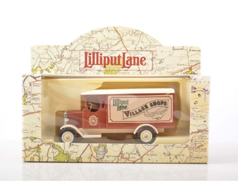 Lilliput Lane diecast:  Eight vintage delivery vans in original boxes and packaging.
