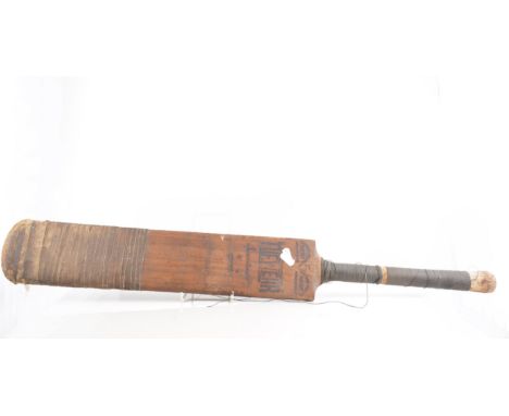 Cricket Interest:  a vintage cricket bat, two cricket balls, a book, "A Hundred Years of Trent Bridge 1938", cricket badges a