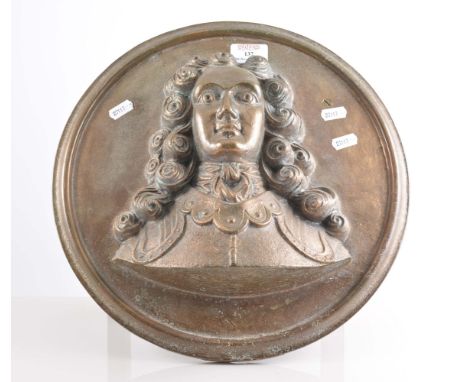 Cast metal circular portrait plaque, high relief, 36cm, wooden stand.