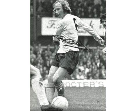 Football Phil Beal signed 12x8 black and white photo pictured in action for Tottenham Hotspur. Good Condition. All autographe