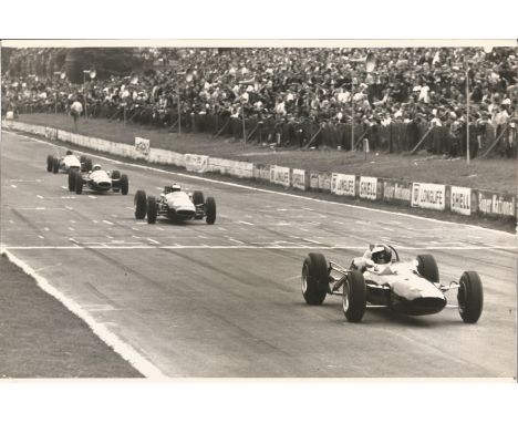 Motor Racing Jim Clark original 11x8 press black and white photo picturing Clark the recent winner of the Indy 500 leading th