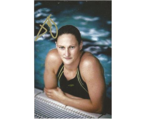 Olympics Manon Van Rooigen signed 6x4 colour photo of the Gold medal winner in the Women's 4x100 freestyle swimming event in 