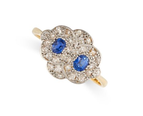 NO RESERVE -&nbsp;A SAPPHIRE AND DIAMOND RING in 18ct yellow gold and platinum, the scalloped face set with two cushion cut b