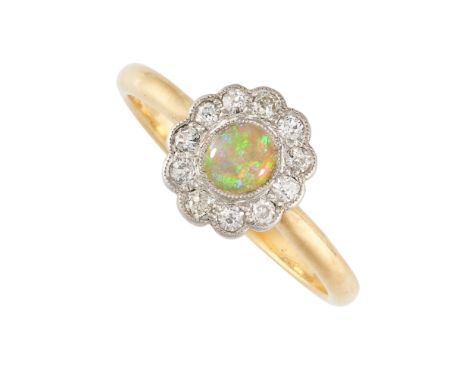 NO RESERVE -&nbsp;AN OPAL AND DIAMOND CLUSTER RING in 18ct yellow gold and platinum, set with an oval cabochon opal, within a