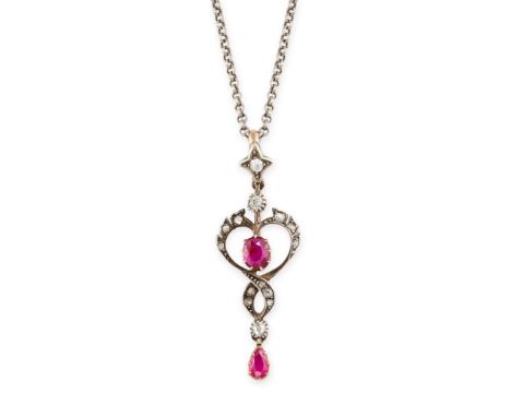 NO RESERVE -&nbsp;AN ANTIQUE RUBY AND DIAMOND PENDANT AND CHAIN in yellow gold and silver, set with an oval cut ruby accented