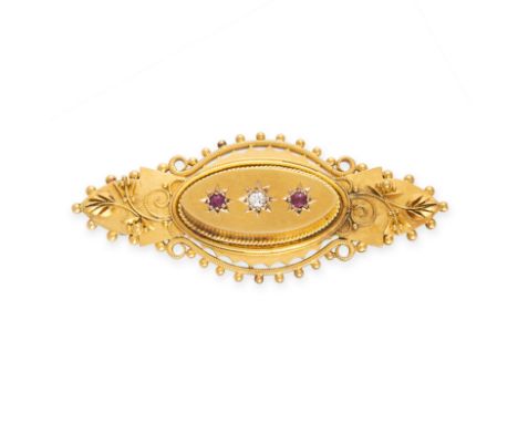 NO RESERVE -&nbsp;AN ANTIQUE RUBY AND DIAMOND BROOCH in 15ct yellow gold, set with an old cut diamond between two cushion cut