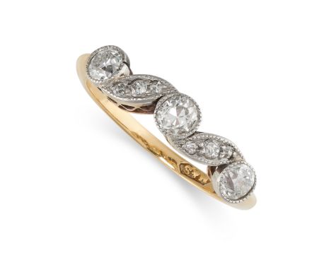 NO RESERVE -&nbsp;AN ART DECO DIAMOND RING in 18ct yellow gold and platinum, the band set with a trio of old cut diamonds acc