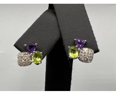 Ladies 9ct white gold diamond, amethyst and peridot stud earrings with butterfly backs.