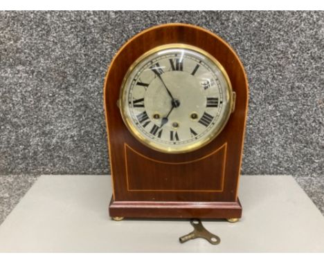 An Edwardian inlaid mahogany mantle clock with key