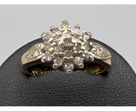 Ladies 9ct gold diamond cluster ring. Featuring round brilliant cut diamonds approx .33ct 3g size K