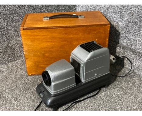 A Benoist-Berthiot projector in wooden case