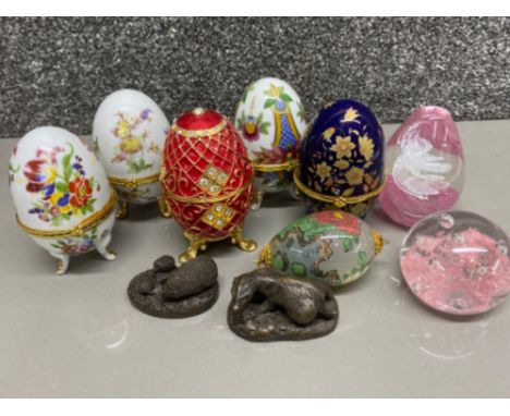Small box of ceramic egg trinkets includes 1x enamelled faberge style, also includes glass paperweights &amp; animal ornament