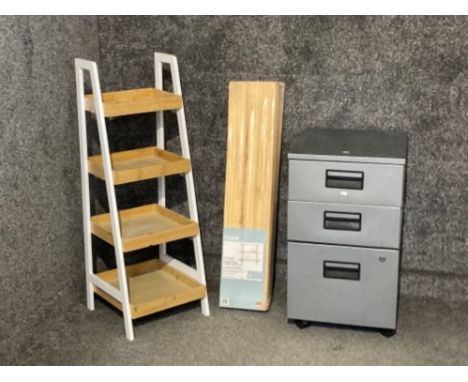 Filing cabinet, four tier storage unit and a three tier shelf kit