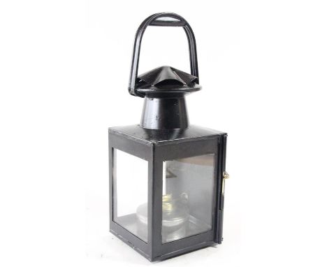 A BR(M) hand lantern with burner 