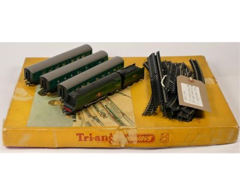 a 1960s Tri-ang T/T gauge electric model railway set, consisting of Merchant Navy Loco. 35028, 3 green coaches and track, all
