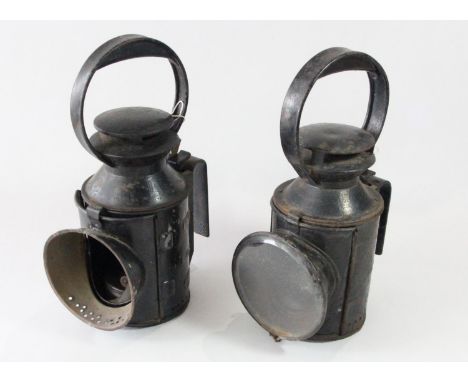 A 3 aspect BR(M) hand lamp complete with burner, together with a 3 aspect LMS hand lamp complete with burner, no front glass 
