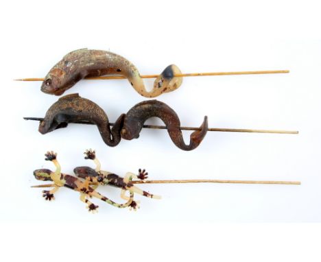 Terra Nova (American sci-fi drama series, 2011) - Production used campfire lizard prop and two campfire fish props, each appr