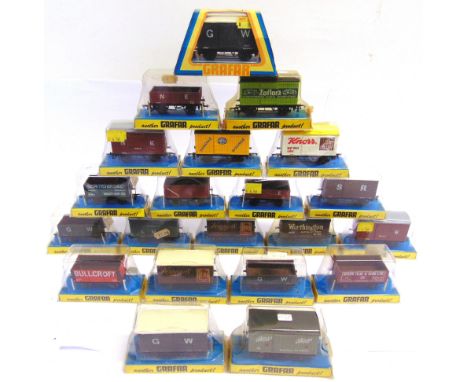 [OO GAUGE]. TWENTY-ONE ASSORTED GRAHAM FARISH WAGONS  each in original packaging (some packaging worn).