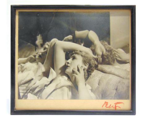 PHOTOGRAPH - SIR CECIL BEATON, C.B.E. (BRITISH, 1904-1980)  Portrait of a reclining female, signed to the mount in red ink 'B