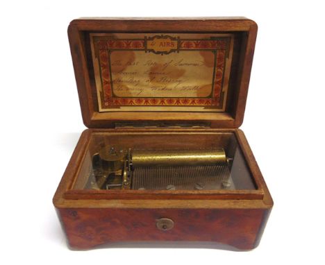 A SMALL MUSICAL BOX  Swiss, late 19th century, the key-wind 7.25cm (2 7/8 inch) pinned brass cylinder set to a brass bed, pla