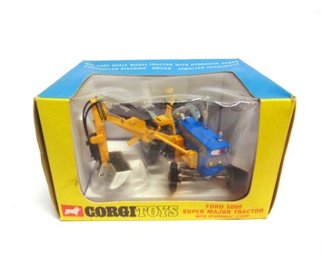 A CORGI NO.74, FORD 5000 SUPER MAJOR TRACTOR WITH HYDRAULIC SCOOP  mid blue, yellow and grey, very near mint, boxed, the box 
