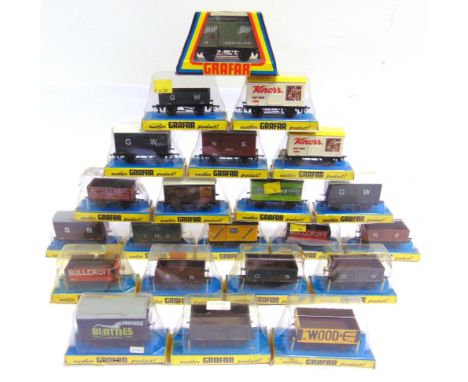 [OO GAUGE]. TWENTY-TWO ASSORTED GRAHAM FARISH WAGONS  each in original packaging (some packaging worn).