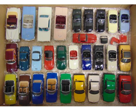 TWENTY-FIVE 1/43 SCALE DIECAST MODEL TRIUMPH SPORTS CARS  together with four Road Signature U.S. cars, each mint or near mint