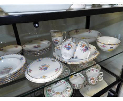 A Czechoslovakian 21 piece ceramic tea service decorated with a floral pattern (qty)