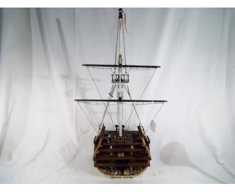 A hand crafted model ship by Peter Coughlin - 'HMS Victory' Lord Nelson's flagship at the Battle of Trafalgar in 1805, a scra