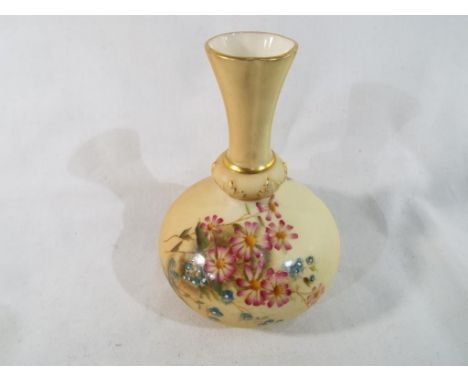An early 20th century Royal Worcester blush ivory bulbous vase hand-painted with floral design 12 cm (h). Estimate £30 - £50