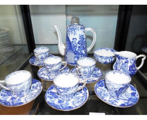 Royal Crown Derby - a collection of sixteen pieces of ceramic tableware decorated in an Asian pattern (qty)