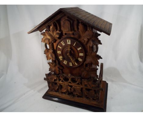 An early 20th century Black Forest style cuckoo clock by Gordian Hettich Sohn, circa 1900, single fusee movement, Roman numer