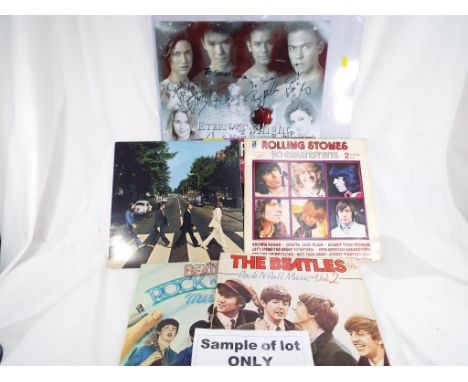 A collection of in excess of 30 x 33.3 record albums to include The Beatles Rock and Roll Music volume 1, The Beatles Abbey R