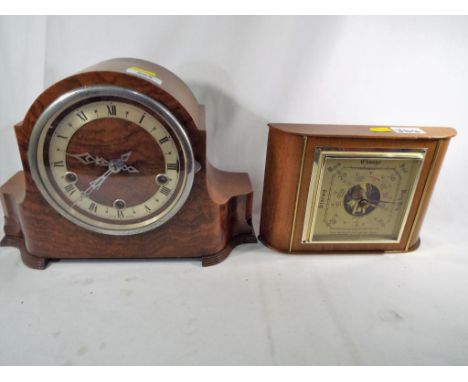 A good quality walnut mantle clock with English movement No. 421434, with pendulum and key, and an oak cased barometer (2)