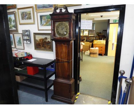 An interesting early 18th century longcase clock, the unsigned brass dial with applied chapter ring having Roman numerals and