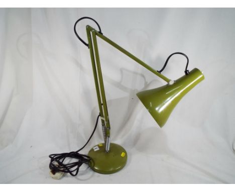 A vintage poise lamp