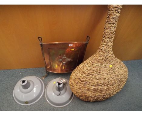 A good quality copper and glass fire screen, a large unusual wicker vase in the form of a bottle and two retro style enamelle