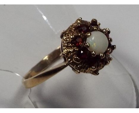 A lady's hallmarked 9 carat gold, opal and garnet cluster ring, approx weight 3.2 gm (all in), size P + 1/2, boxed - Est £40 