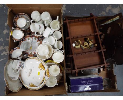 Two boxes containing a large collection of ceramic tableware, wooden displays, Royal Commemorative, a small quantity of Wade 