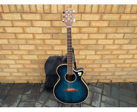 A Crafter semi acoustic 6-string guitar, blue, displaying Crafter paper label model No. FX - 550 EQ, serial No. 80600360 with