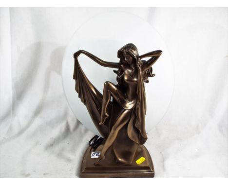 An Art Deco style lamp depicting a lady with glass backdrop approximately 38 cm (h)