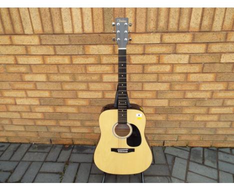 A Valeta acoustic guitar displaying paper label inside, model No. DT6100
