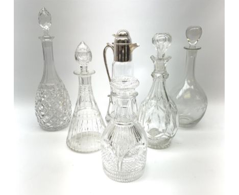 A clear glass claret jug with silver plated mount, together with a selection of decanters, to include an Edwardian etched exa