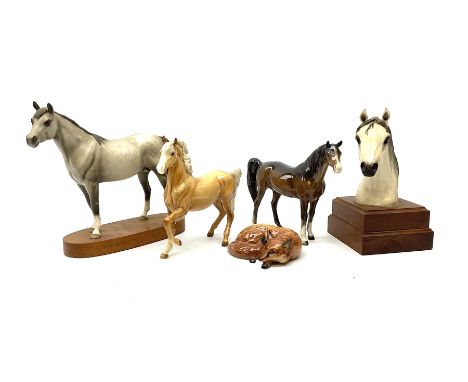 A group of assorted figures, comprising Beswick Arab 'Bahram' Connoisseur' horse, model no 1771, Beswick Palomino horse, mode